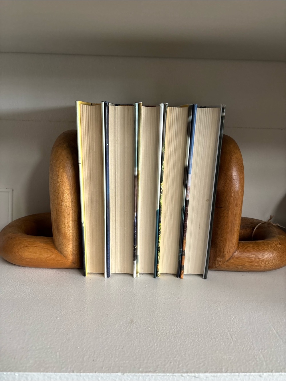 Pair of wood arched looped bookends with tag